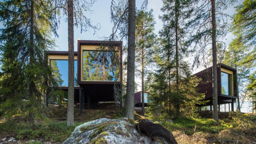 arctic treehouse hotel suites situation from the road down hill 900x505